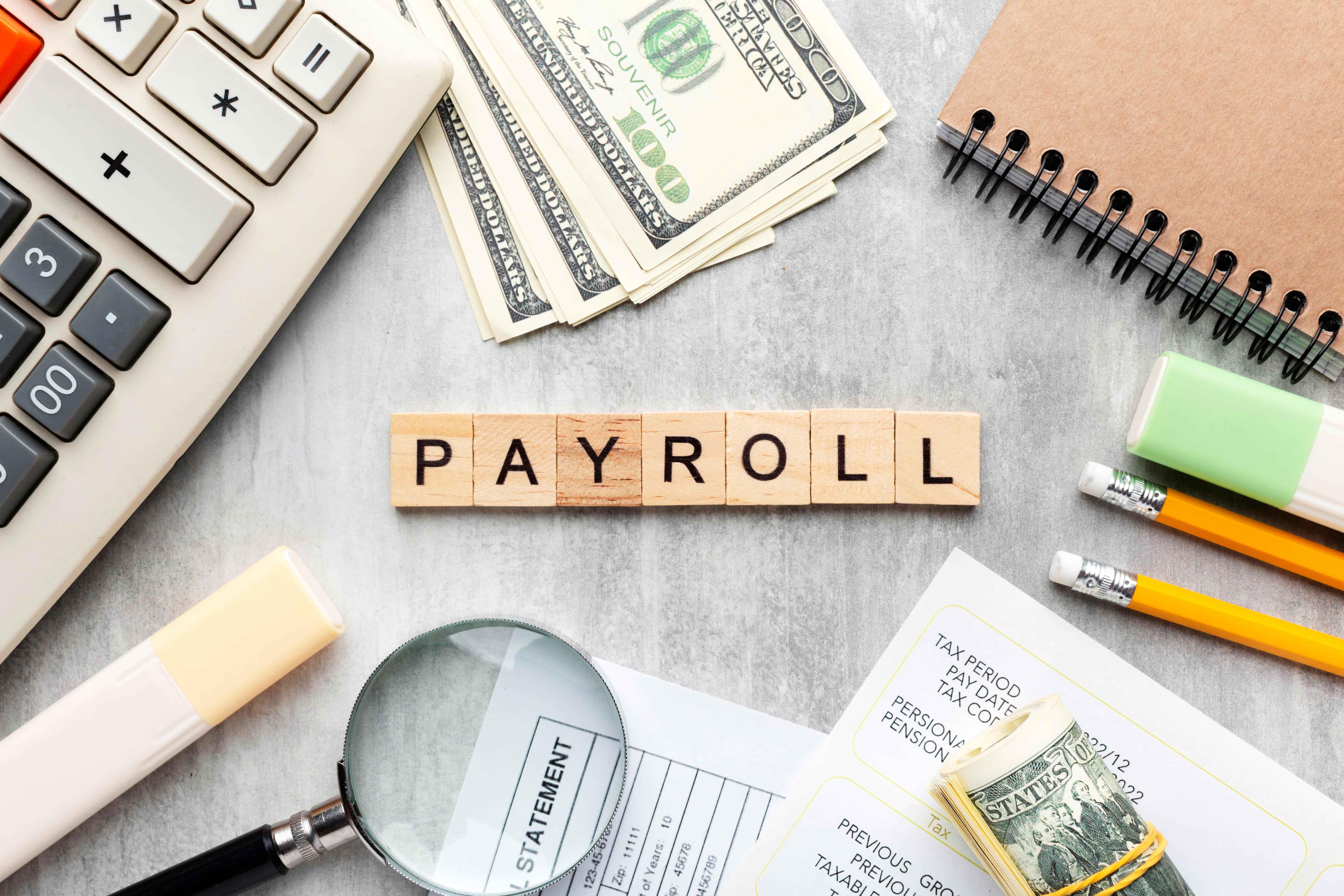 top-view-payroll-concept-with-items.jpg